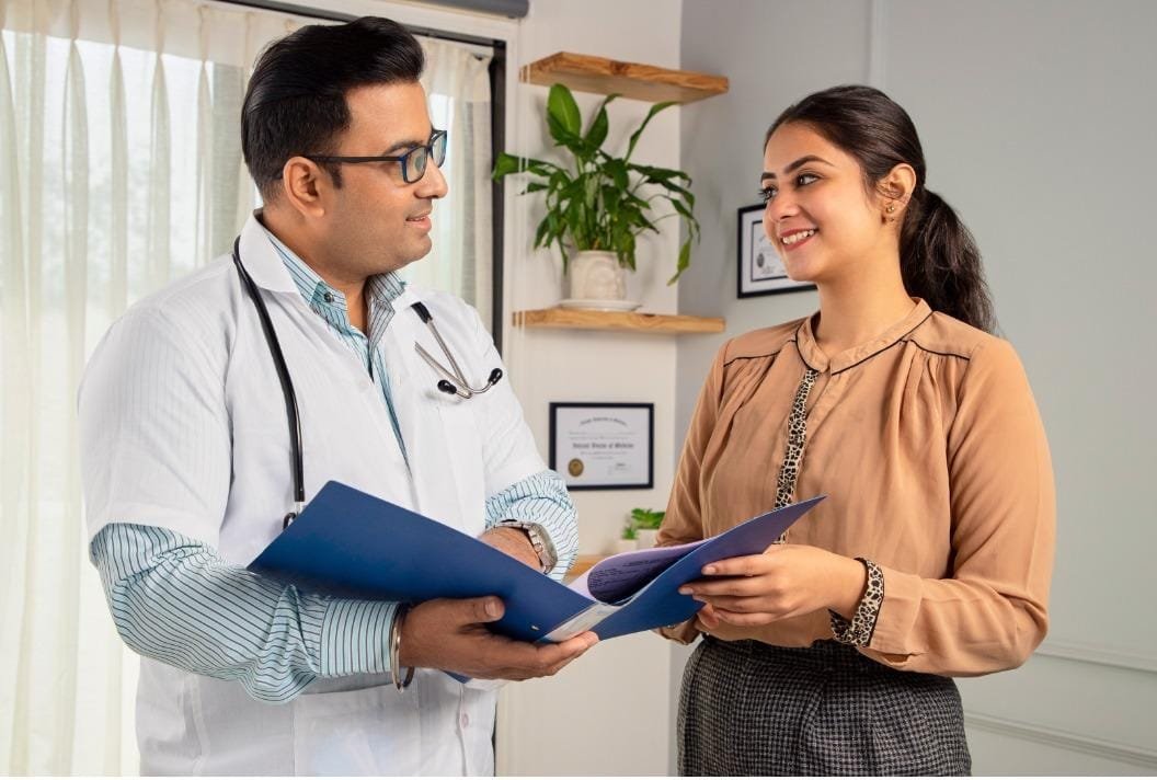 Doctor discussing personalised cancer care with a patient